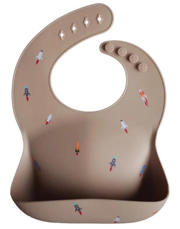 Bavoir en silicone imprimé fusée Mushie